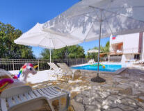 sky, swimming pool, table, umbrella, furniture, outdoor, chair, tent